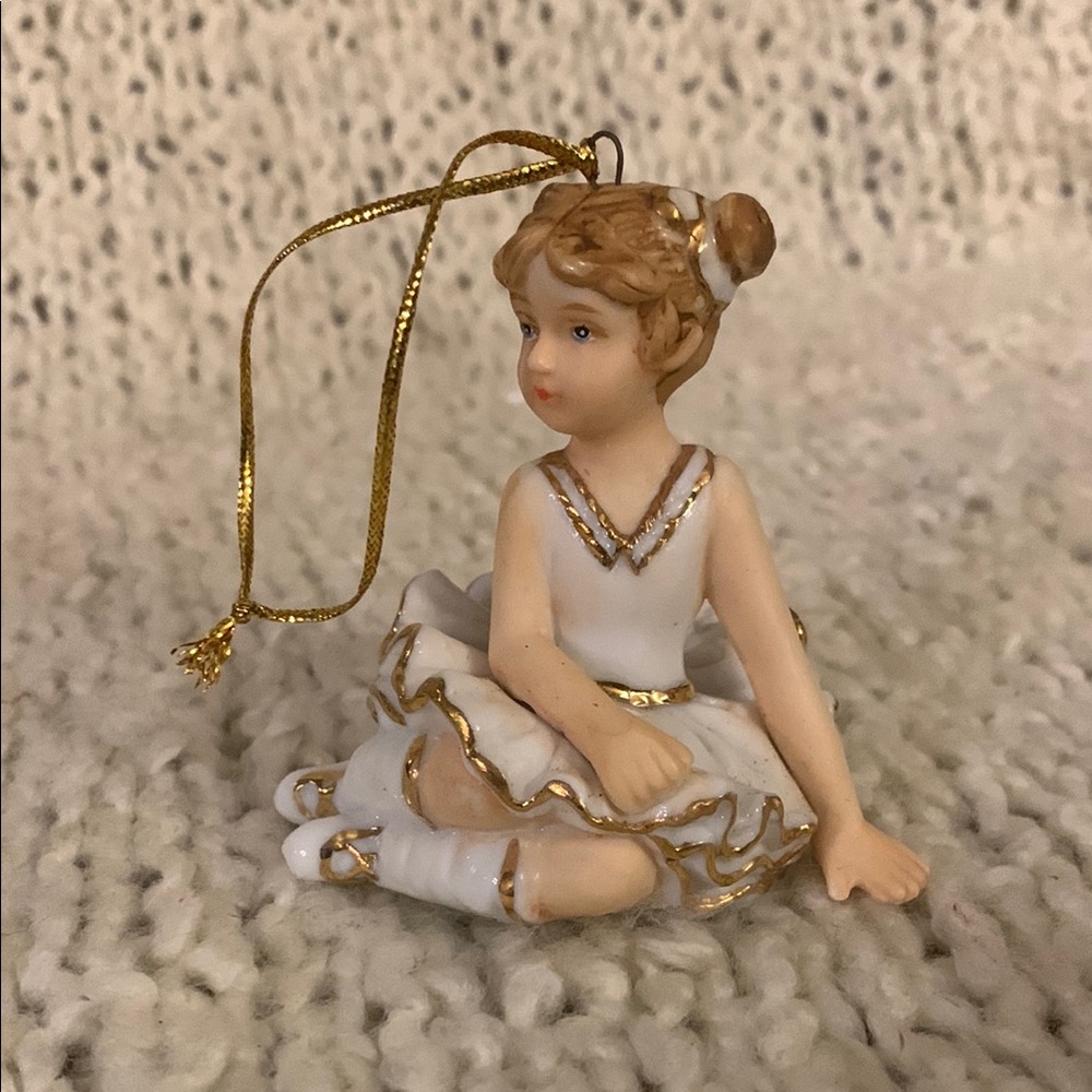 White and gold Ballerina ornament,approximately 3 inches tall.